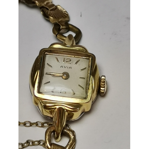 438 - A lady's 9 carat gold watch, the white circular dial signed Aoia 15 Jewels, with gilt Arabic numeral... 