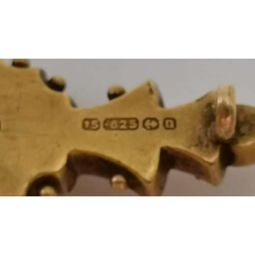 439 - An antique 15 carat gold brooch, the central heart set with a white stone, with leaf sprays either s... 