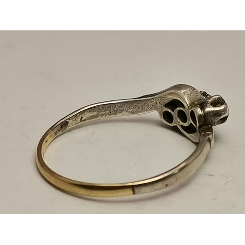 442A - Four 9 carat gold gem-set rings, variously set with white and blue stones, including three-stone cro... 