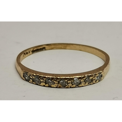 442A - Four 9 carat gold gem-set rings, variously set with white and blue stones, including three-stone cro... 