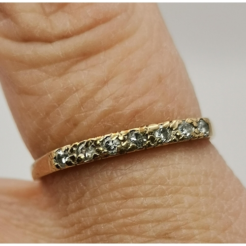 442A - Four 9 carat gold gem-set rings, variously set with white and blue stones, including three-stone cro... 