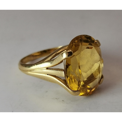 444A - A 9 carat gold gem-stone pendant, set with a rectangular purple stone to twin vertical white gold ba... 