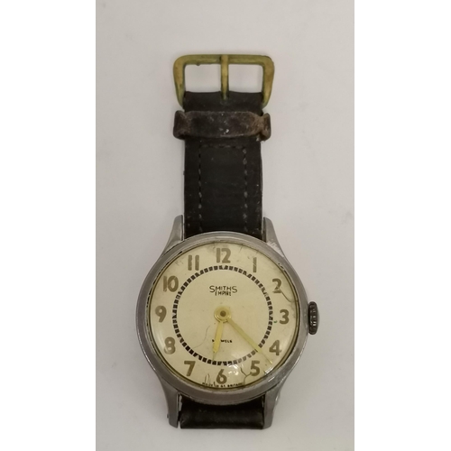 456 - A lady's 9 carat gold wristwatch, the white circular dial unsigned, with Arabic numerals, blued stee... 