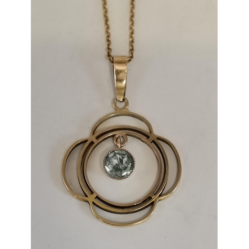457 - An Art Nouveau style 9 carat gold pendant necklace on chain, the openwork quatrefoil pendant hung wi... 