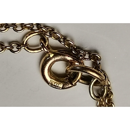 457 - An Art Nouveau style 9 carat gold pendant necklace on chain, the openwork quatrefoil pendant hung wi... 