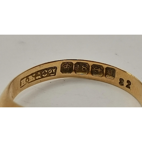 458 - An 18 carat gold five-stone ring, the broad navette-shaped top set with three graduated round blue s... 