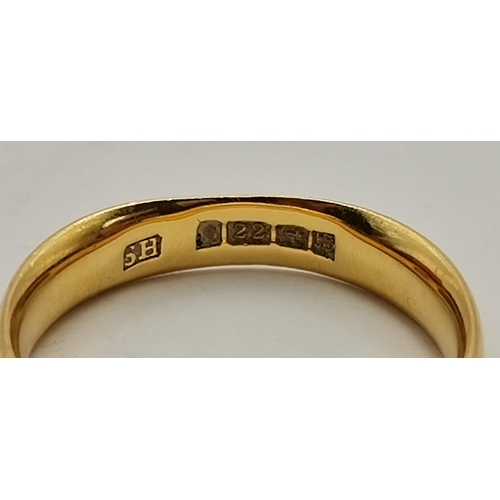 458A - A 22 carat gold band ring, hallmarked Birmingham. Ring size H1/2, 3.5g