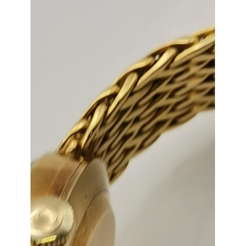 459 - A lady's 18 carat gold bracelet wristwatch, the silvered circular dial signed Certina, with blued st... 