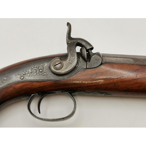 469 - A 19th Century percussion travelling pistol, signed POWELL SHEFFIELD to lockplate, with scrolling fo... 