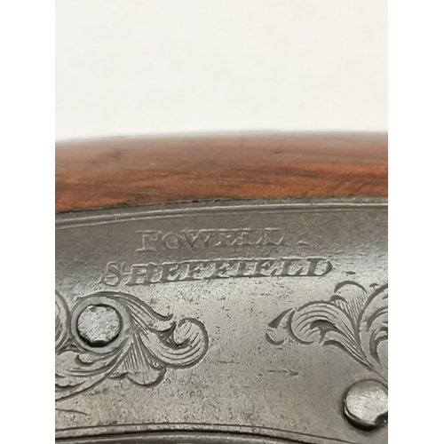 469 - A 19th Century percussion travelling pistol, signed POWELL SHEFFIELD to lockplate, with scrolling fo... 