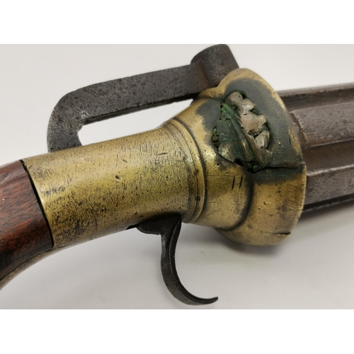 472 - An antique pepperbox six-shot percussion revolving pistol, unmarked, with brass furniture, (a/f). 4.... 