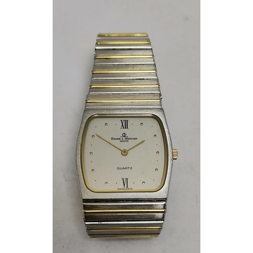 482 - A bi-metal quartz steel bracelet wristwatch, 1980s, the silvered cushion shaped dial signed Baume & ... 
