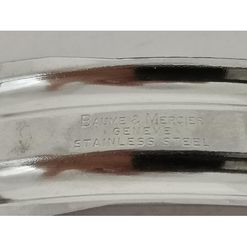 482 - A bi-metal quartz steel bracelet wristwatch, 1980s, the silvered cushion shaped dial signed Baume & ... 