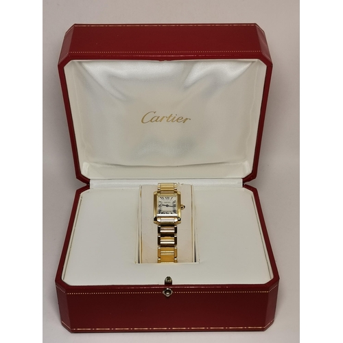 484a - Cartier: A lady's 18 carat gold Tank Française bracelet wristwatch, ref. 2385, the ivory dial signed... 