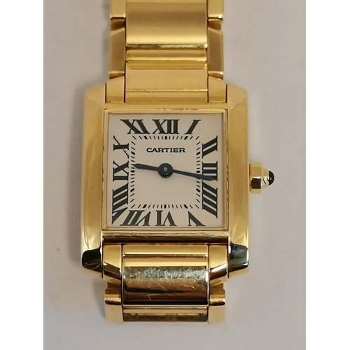484a - Cartier: A lady's 18 carat gold Tank Française bracelet wristwatch, ref. 2385, the ivory dial signed... 