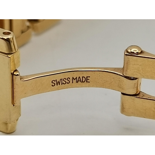 484a - Cartier: A lady's 18 carat gold Tank Française bracelet wristwatch, ref. 2385, the ivory dial signed... 