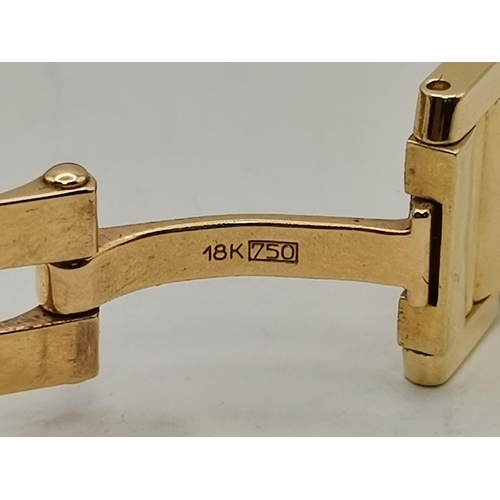 484a - Cartier: A lady's 18 carat gold Tank Française bracelet wristwatch, ref. 2385, the ivory dial signed... 