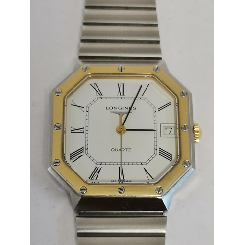 485 - A quartz steel and gilt metal bracelet watch, 1980s, the octagonal white dial signed Longines, ref. ... 