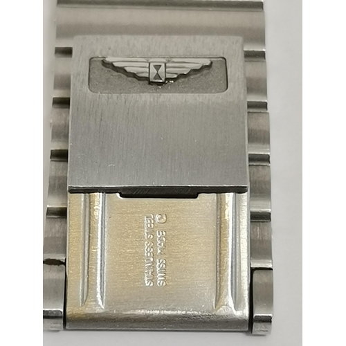 485 - A quartz steel and gilt metal bracelet watch, 1980s, the octagonal white dial signed Longines, ref. ... 