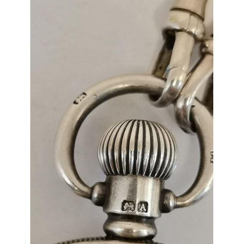 488A - Rolex: A George V silver-cased open-face pocket watch, the white enamel dial signed Rolex, with gilt... 