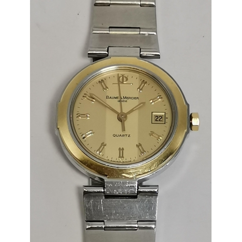 489 - A lady's bi-metal steel bracelet wristwatch, 1990s, the circular dial signed Baume & Mercier, with g... 