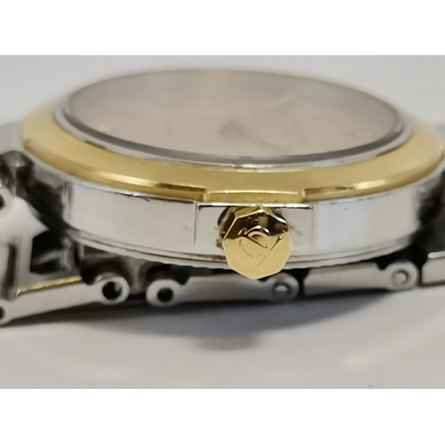 489 - A lady's bi-metal steel bracelet wristwatch, 1990s, the circular dial signed Baume & Mercier, with g... 