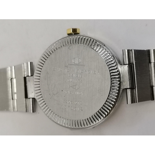 489 - A lady's bi-metal steel bracelet wristwatch, 1990s, the circular dial signed Baume & Mercier, with g... 
