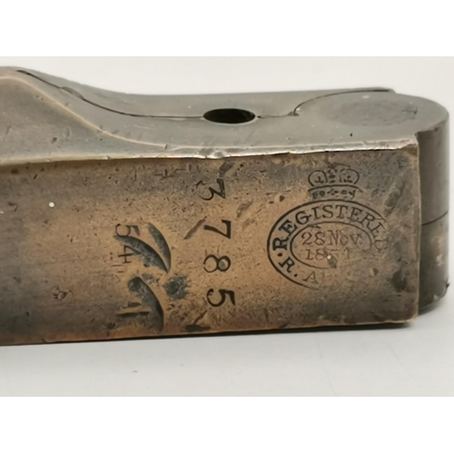 504A - A 19th Century powder flask, copper and brass, repoussé with a gentleman and two hunting dogs, marke... 