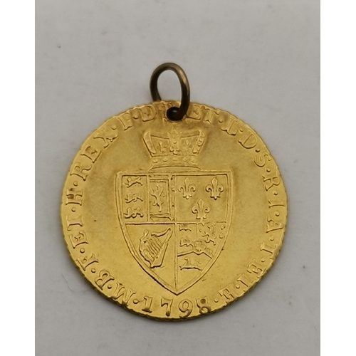 514A - A George III 1798 spade half guinea pendant, pierced with a hanging loop. 4.2g gross