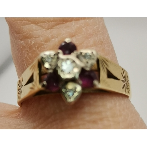 518 - 18ct Gold, Ruby and Diamond Cluster ring size Q gross weight 5 grams