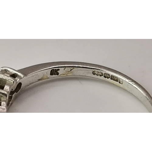 519 - 9ct White Gold three stone ring size P