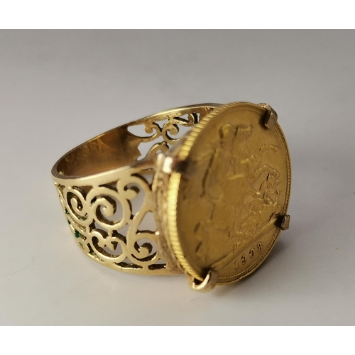 521A - A 9 carat gold-mounted Edward VII 1903 half sovereign ring, the coin claw-mounted to a broad shank w... 