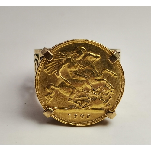521A - A 9 carat gold-mounted Edward VII 1903 half sovereign ring, the coin claw-mounted to a broad shank w... 