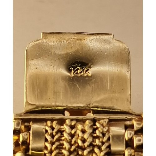 525A - A 14 carat gold fancy mesh link bracelet, the plain clasp engraved 'Eileen', stamped '14K' to inner ... 