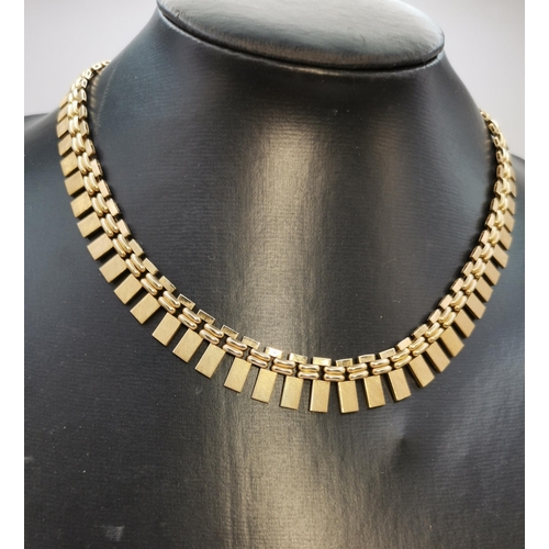 526A - An 18 carat gold textured block fringe necklace, hallmarked 18-750. 44cm long, 49.4g