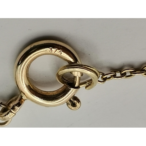 527 - A 9 carat gold-mounted baroque pearl necklace, the fine trace chain spaced with twenty-one small pea... 