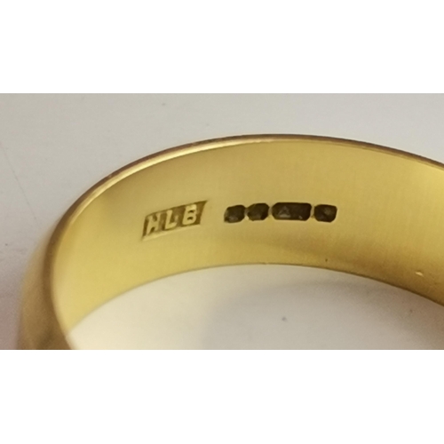 531A - An 18 carat gold band ring, plain with bevelled edges, hallmarked 750. Ring size U, 6.3g