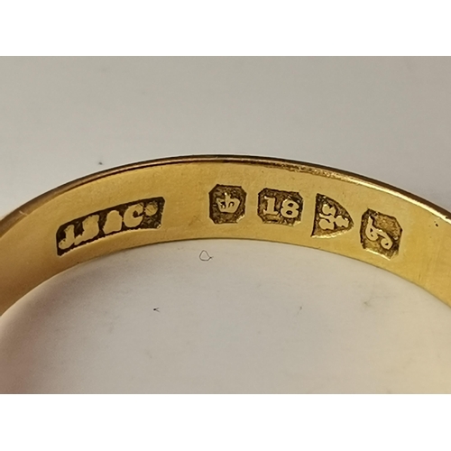 532A - An 18 carat gold solitaire ring, the white stone claw-set to ridged and tapering shoulders, hallmark... 