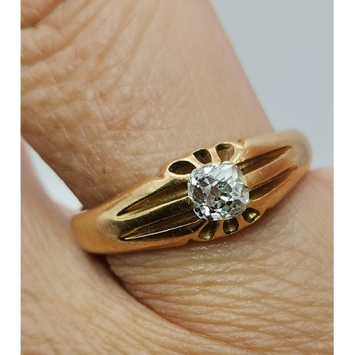 532A - An 18 carat gold solitaire ring, the white stone claw-set to ridged and tapering shoulders, hallmark... 