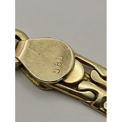 533 - A 14 carat gold fancy brick link bracelet, stamped '585' each side of clasp. 21.5cm long, 13.8g