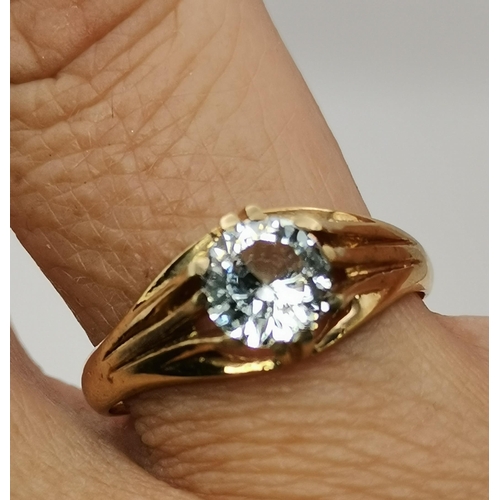 535A - A 9 carat gold white stone solitaire dress ring, the large glass (CZ?) stone claw-set to a grooved a... 
