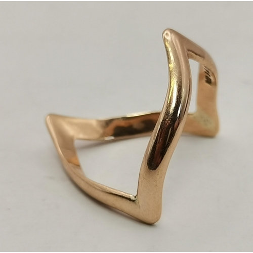 536A - Two 9 carat gold rings, the first a bulbous band with engraved diagonal decoration, ring size V; the... 