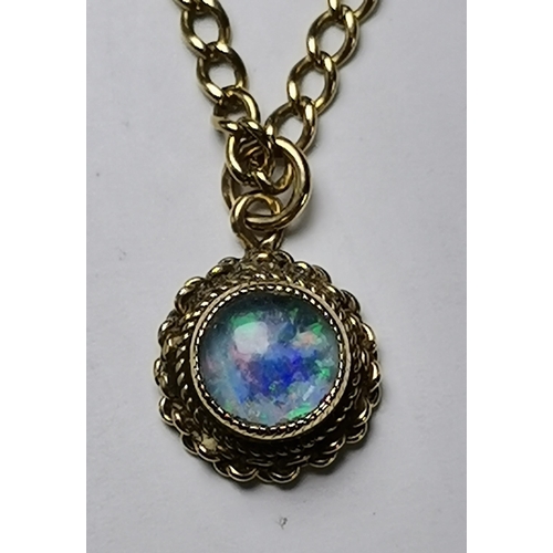 539 - A 9 carat gold fine curb chain necklace hung with a 9 carat gold-mounted foil-backed opal pendant, a... 