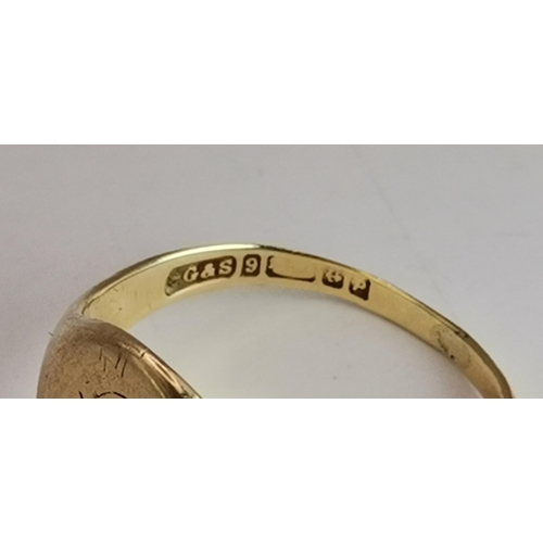 544 - A 9 carat gold signet ring, the oval black onyx matrix carved with a classical portrait, hallmarked ... 