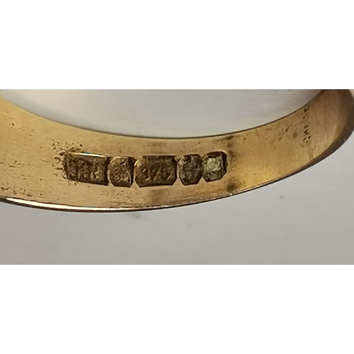 545 - A 9 carat gold and diamond buckle ring, with chased foliate and floral decoration, set with eight sm... 