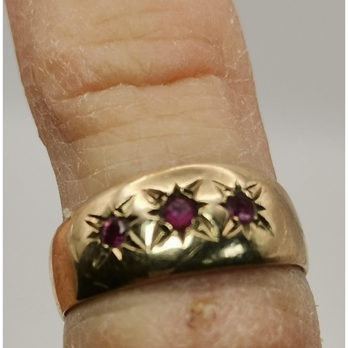 545 - A 9 carat gold and diamond buckle ring, with chased foliate and floral decoration, set with eight sm... 