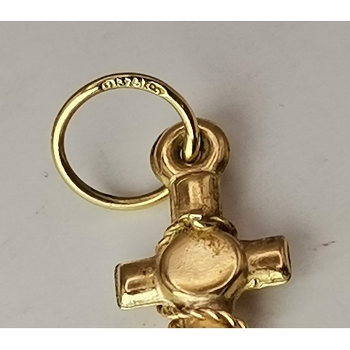 546 - A 9 carat gold swivel locket pendant to a fine Figaro chain; together with a 9 carat gold fouled anc... 