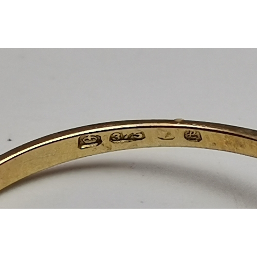 548A - A 9 carat gold five stone ring, with three graduated round blue stones spaced by two round white sto... 