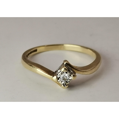 557 - Three 9 carat gold gem-set rings, comprising a solitaire white stone to a square mount and cross-ove... 