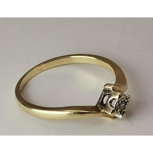 557 - Three 9 carat gold gem-set rings, comprising a solitaire white stone to a square mount and cross-ove... 